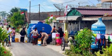 Bantuan air bersih oleh PDAM Tirtauli