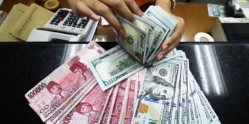 Rupiah masih melemah 0,14% ke Rp 14.680 per dolar AS di jelang siang ini