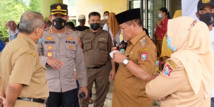 Plt Walikota Bersama Kapolres Tanjung Balai Meninjau Pelaksanaan Vaksinasi Massal Pemko Bersama TNI-POLRI