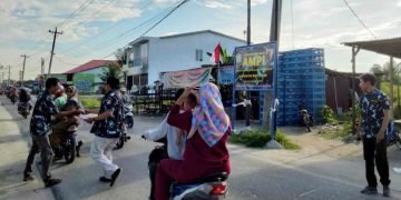 Memperingati HUT Kemerdekaan RI Ke-77 Tahun, DPD AMPI Batu Bara Tebar Bendera Merah Putih