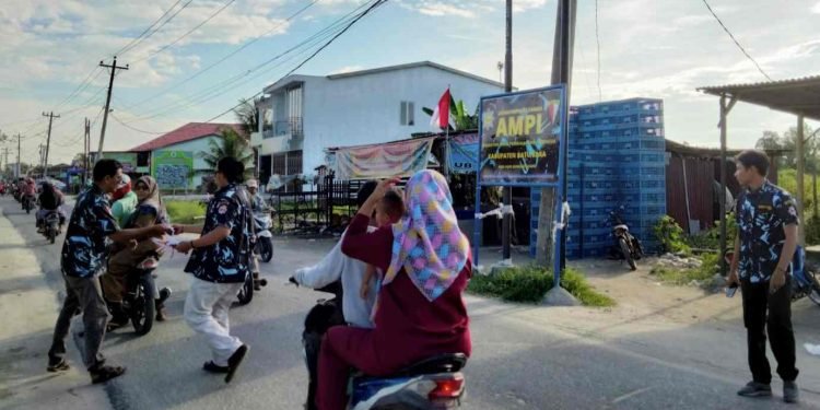 Memperingati HUT Kemerdekaan RI Ke-77 Tahun, DPD AMPI Batu Bara Tebar Bendera Merah Putih