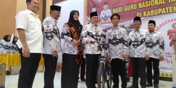 Bupati dan Kadin Batu Bara Hadiri HUT PGRI ke 77