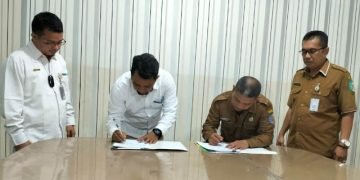 Disnakerprindag Tanda Tangani Kerjasama dengan Bulog Kisaran