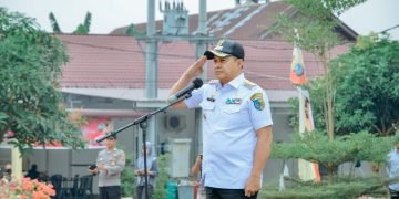 Wujudkan Pemilu Serentak  Kondusif & Aman 2024, Bupati Zahir Pimpin Apel Satkamling