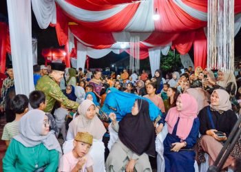 Dihadiri Bupati Zahir, Perayaan HUT ke-56 Desa Simpang Dolok Berlangsung Meriah