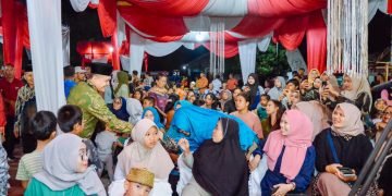 Dihadiri Bupati Zahir, Perayaan HUT ke-56 Desa Simpang Dolok Berlangsung Meriah