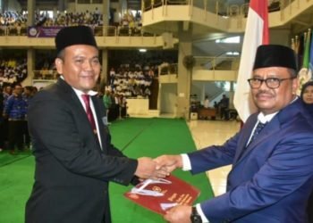 Dosen Unimed Dr. Muhammad Surif, M.Si Terima Penghargaan dari Presiden Joko Widodo