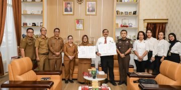 dr Susanti Dewayani SpA dan Kajari Pematangsiantar Menandatangani Nota Kesepakatan terkait DATUN