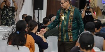 Pjs Wali Kota menghadiri silaturahmi dan sosialisasi Tanggap Darurat Tahap II kepada pedagang korban dan terdampak kebakaran gedung IV Pasar Horas