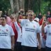 Pj. Bupati Langkat Faisal Hasrimy Lepas Ribuan Guru dalam Gerak Jalan Santai HUT PGRI ke-79
