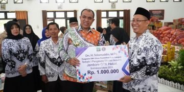 Pj Bupati Langkat Buka Kemah Bakti Perempuan PGRI: Dorong Langkat Pintar Menuju Indonesia Emas 2045