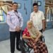 Dinsos Batu Bara Serahkan Kursi Roda dan Alat Bantu Dengar kepada Penyandang Disabilitas